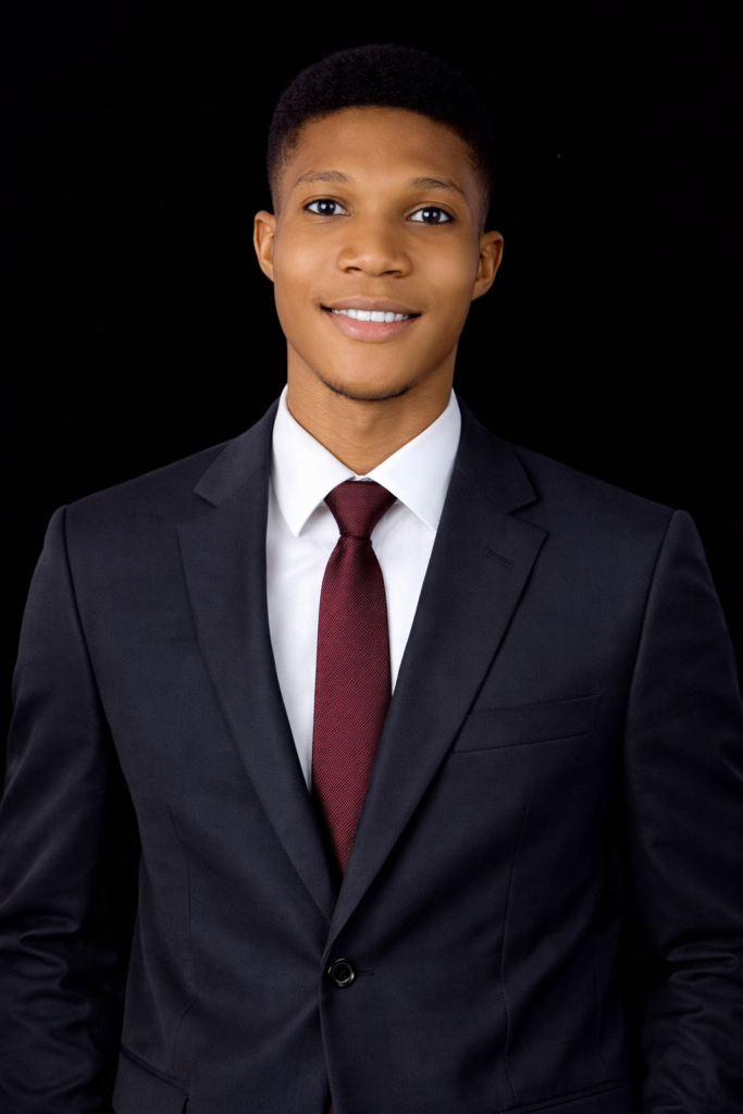 Sharp suit and warm smile